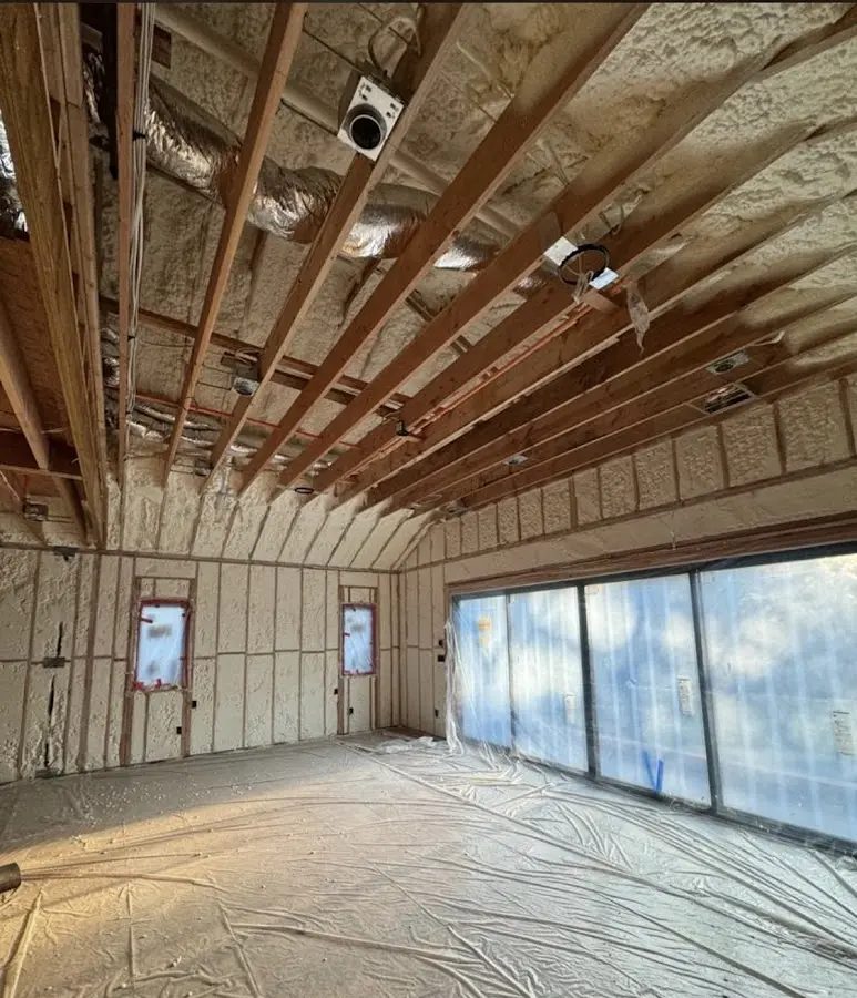 Interior walls and ceiling insulated with spray foam during new construction in Morgan City